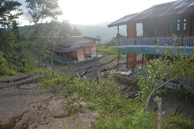 A school sits knocked off its foundation and cracked because of the floods, rendering children in Hakha without a school to go to until repairs can be made