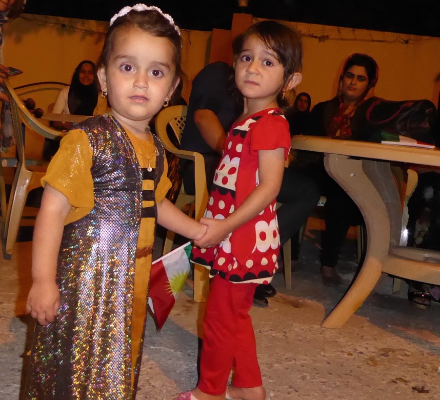 Two children who've lost their father in the fight against ISIS.
