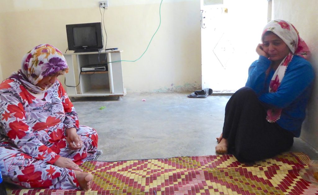 Arjin's aunts grieving the loss of their family members.