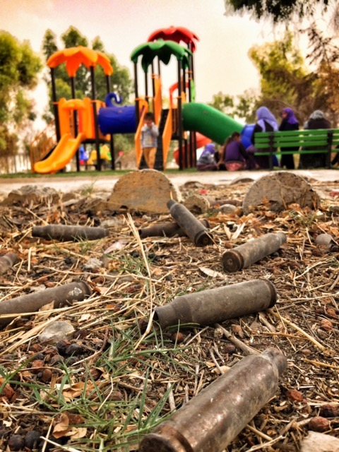 Playground rises above the shells.