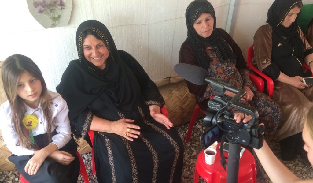 Kurd mother and daughter on the line to help