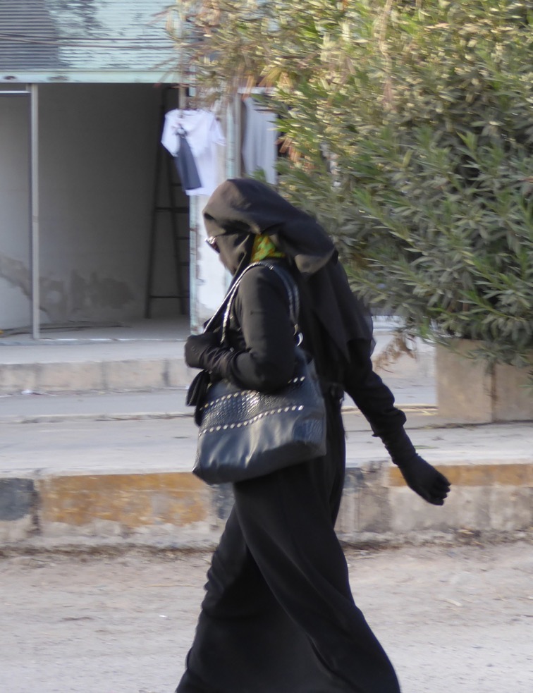 Muslim Arab Woman on the streets of Manbij