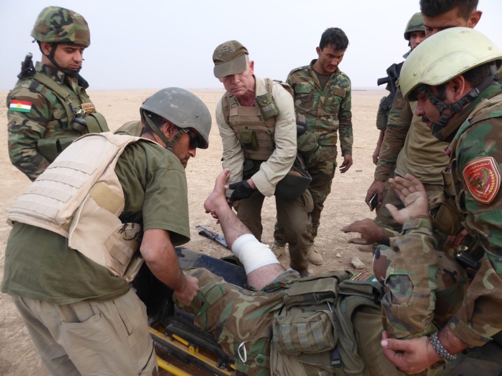Wounded Kurd Peshmerga being treated by FBR and Kurd medical team Photo; FBR