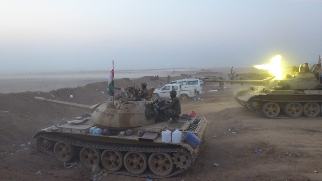 Kurd tanks return fire to ISIS as they prepare to advance on Faizalia. 