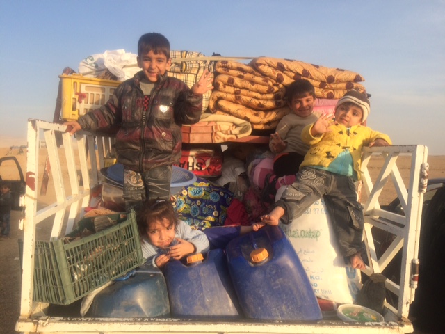 Children play among the supplies. Photo: FBR.