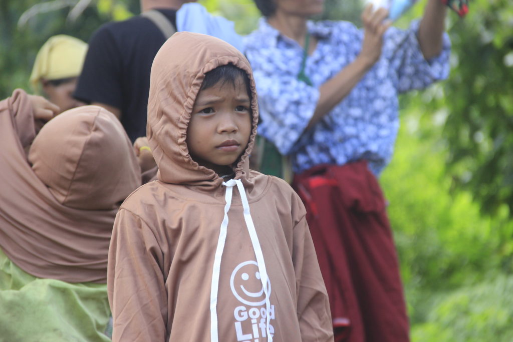 A Karen boy looks over a GLC program at Htee Thay Khee IDP camp. Photo: FBR. 