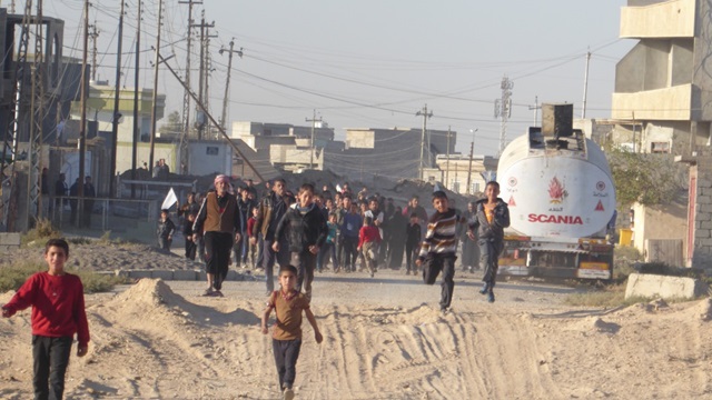 Mosul residents coming for food delivered by FBR.