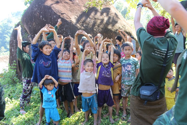 Teams sing with village children