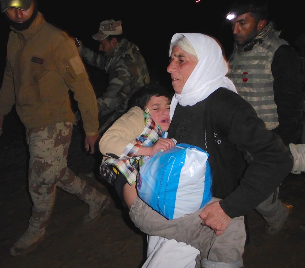 Ayman and his grandmother when they reunited on the Kurdish border. Photo: FBR.