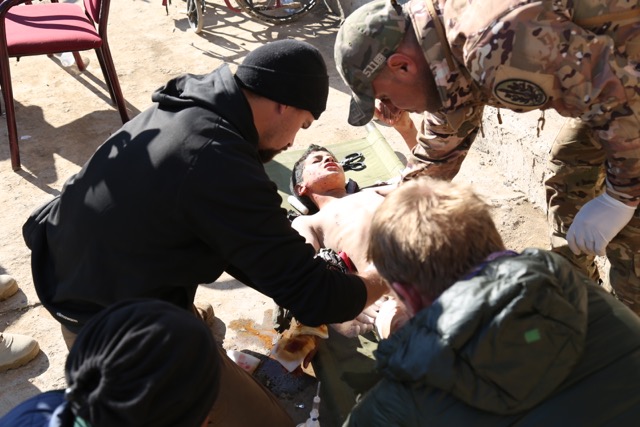 Treating a young patient hit by mortar shrapnel