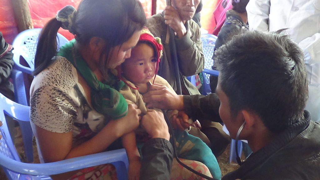 Karen medics treat Kachin patients