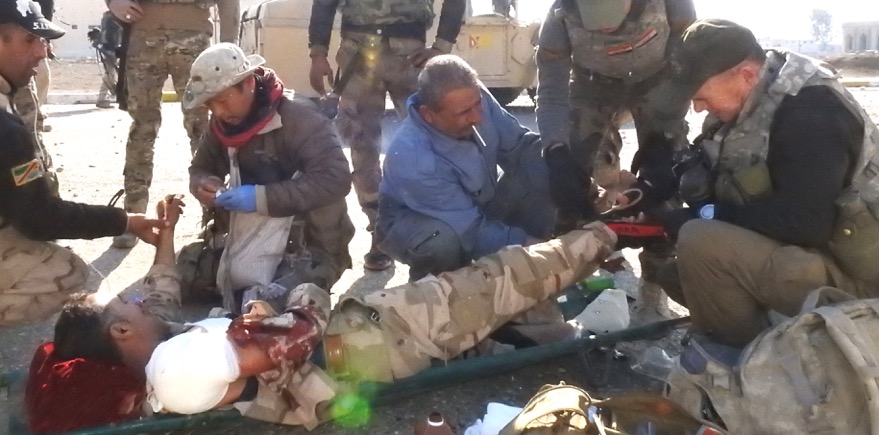 Eliya (Karen medic), Dave and Iraqi soldiers treat wounded in Mosul, Iraq