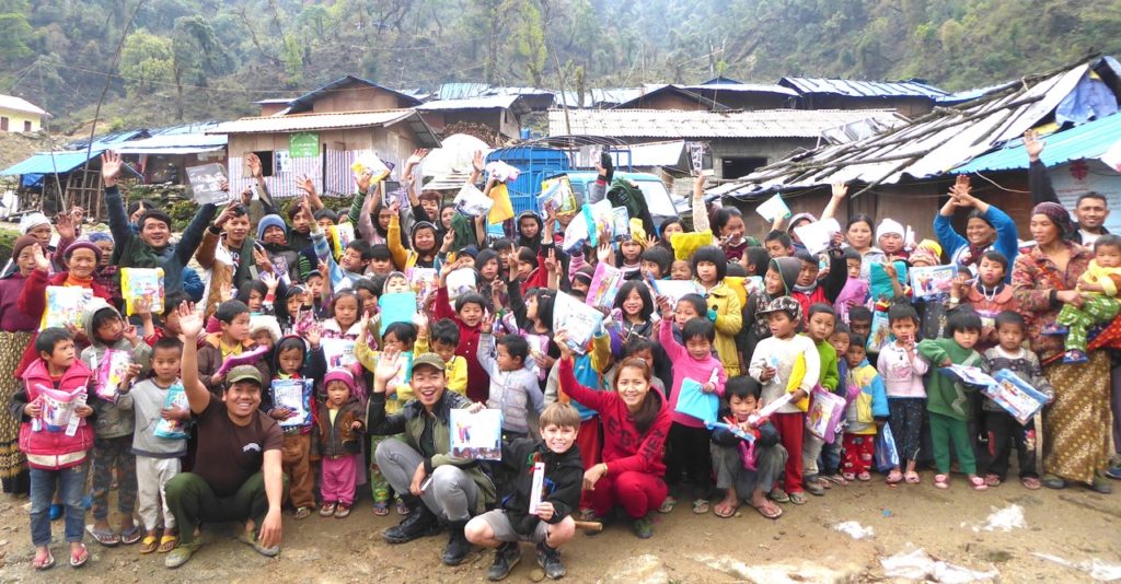 Pete with Kachin FBR team and Kachin children in a IDP camp where they hide from Burma Army attack