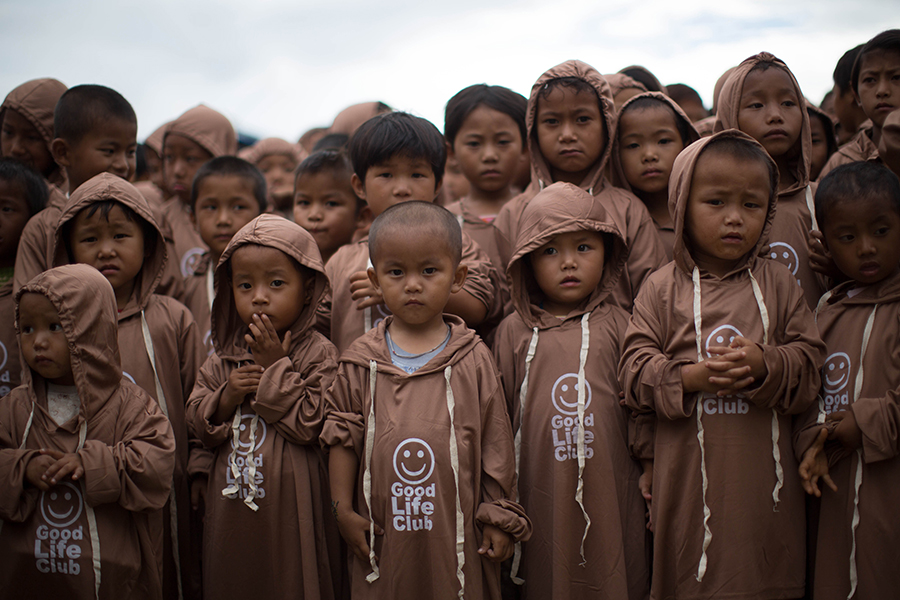 Children with their new Good Life Club (GLC) shirts at a GLC program in Kachin State, Burma. (2013)