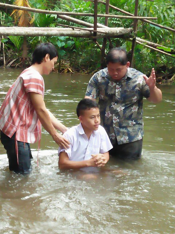 Ko Rin is baptized.