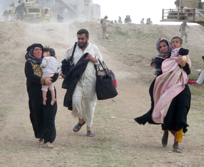 This video captures families fleeing under fire from ISIS during the renewed Iraqi coalition push into North West Mosul in order to liberate the city from ISIS.