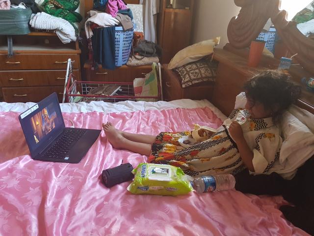 The rescued girl watching CBN's Superbook