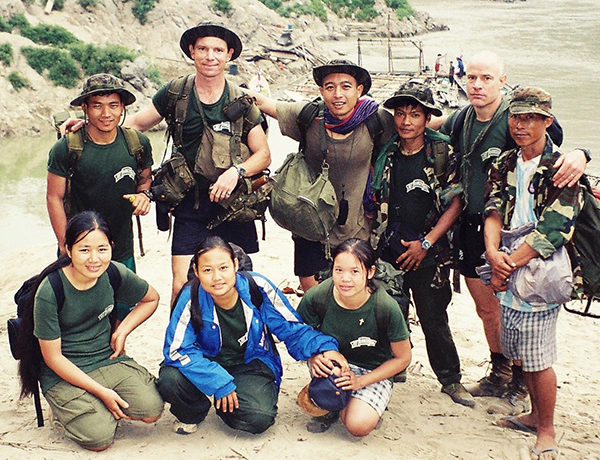 Mucu, far right, and the original Free Burma Ranger team in Burma 1999. Back Row, R-L: Mucu, Shannon, Monkey, Eilya, Dave, Toe Bee Bay. Front Row, R-L: Paw Htoo, Rezina, Yellow Squirrel