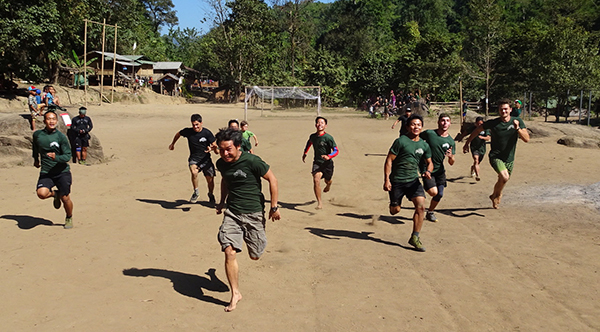 Karen, Shan, Kachin, Kurd/Iraqi, Italian and American rangers race each other in the 100-yard dash of the reunion games. 