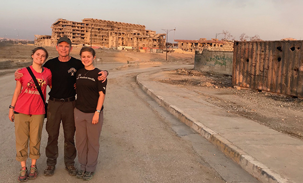 Sahale, myself, and Suu in front on the street where we rescued Demoa with the help of an Iraqi tank and US smoke.