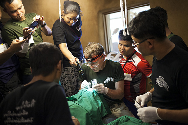 D.r Bob and medics operate.