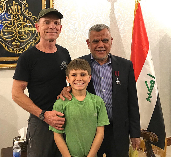 Peter and I with Hadi Al Amiri. 