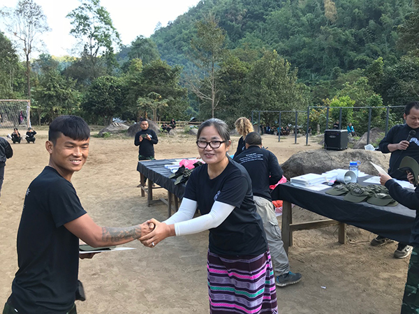 20-year ranger gives award to one of our Shan rangers.