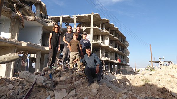 Bashir and some of our team in the ruins of Kobani.