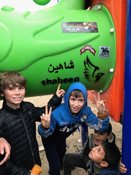 Pete and friends at the new playground built in Shaheen’s honor in Mosul.