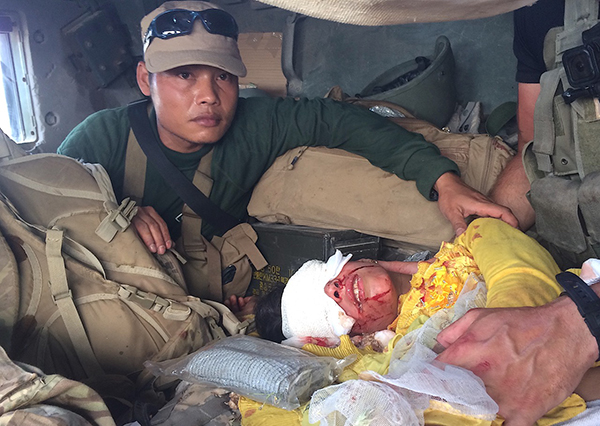 Aisha, shot in the face and being kept alive by Slowly and Sky in the Humveee disabled by ISIS fire on 4 May 2017.