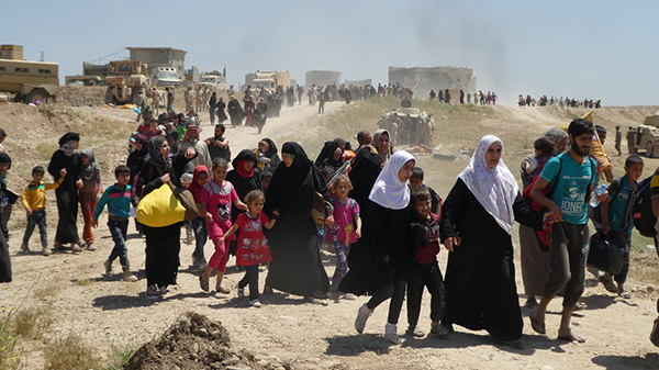 Families flee ISIS in Mosul, May 2017.