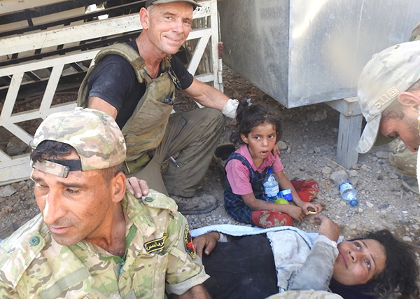 Dave, Zuhair, the little girl and one other woman who was rescued at the same time.