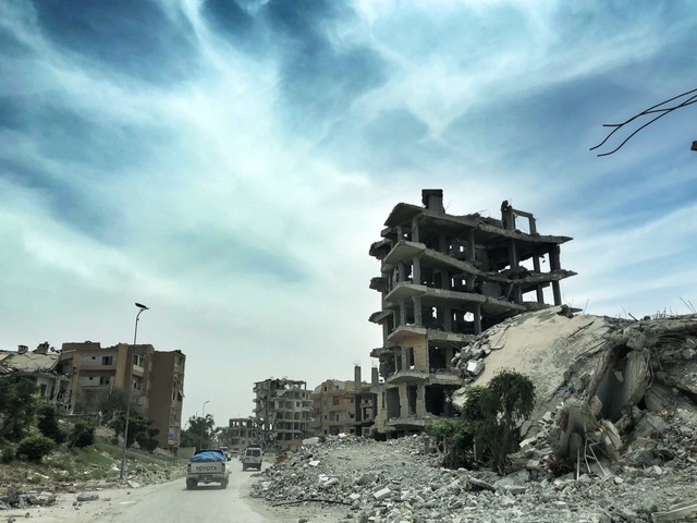 Our team drives into Raqqa, still largely destroyed.