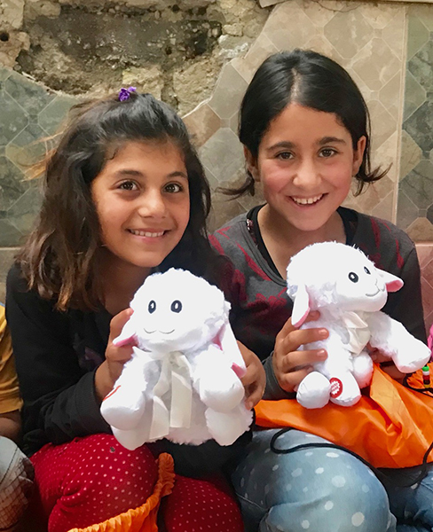 Yezidi girls with lions and lambs provided by Victor Marx from All Things Possible Ministries.