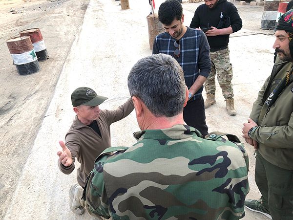Praying with the Syrian Army as the SDF Kurds look on