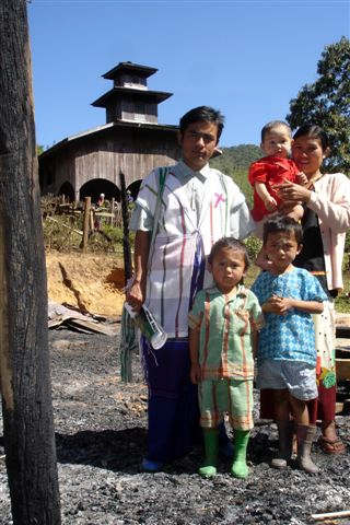 <span class="bodyCopy">Pastor's family in the ashes of their home burned by 