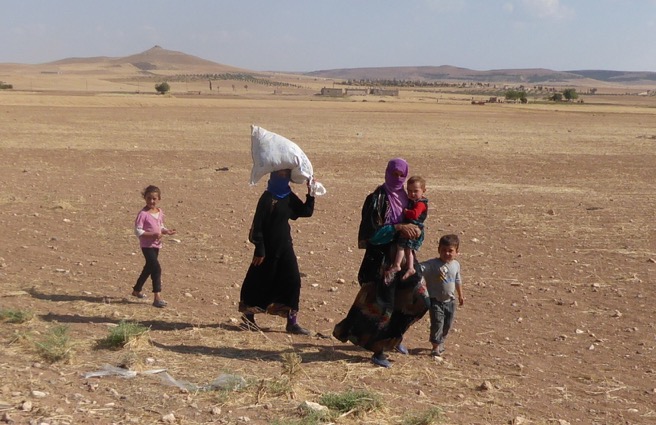 Families fleeing as ISIS is pushed back