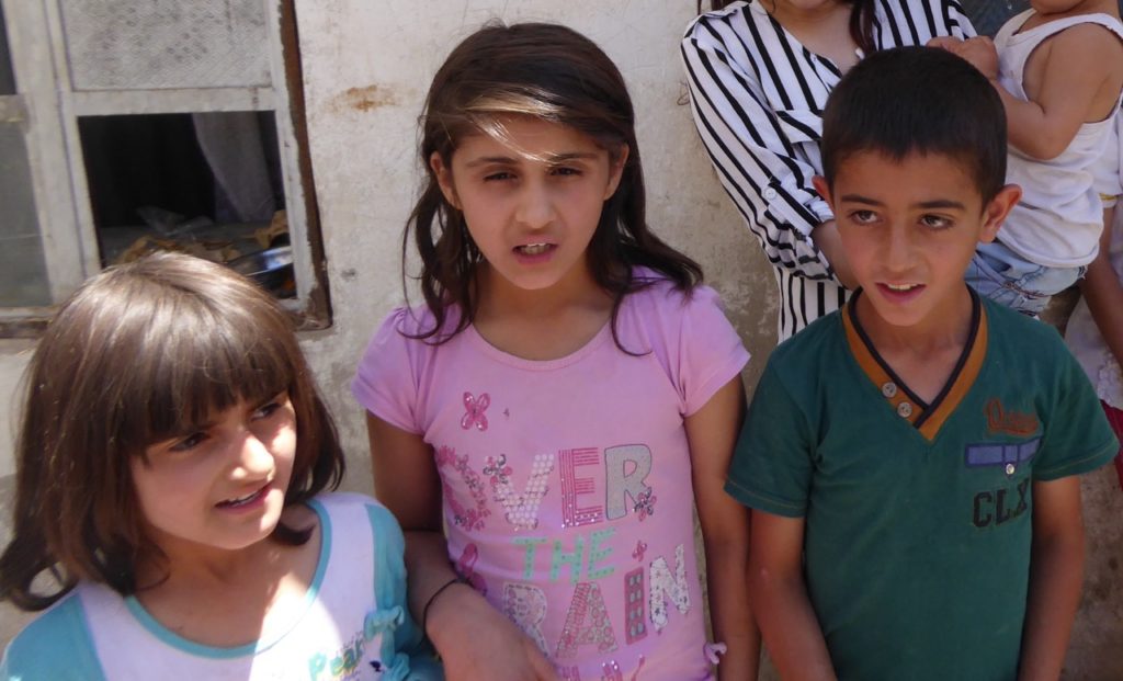 Arjin (pink shirt) with her sister and a cousin.