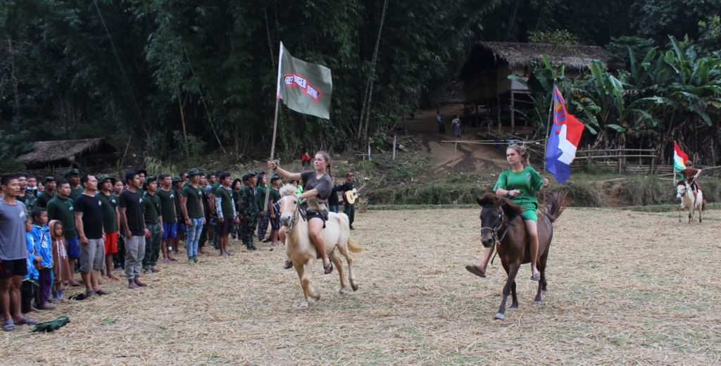 Riding the flags in as the Karen national anthem is sung.