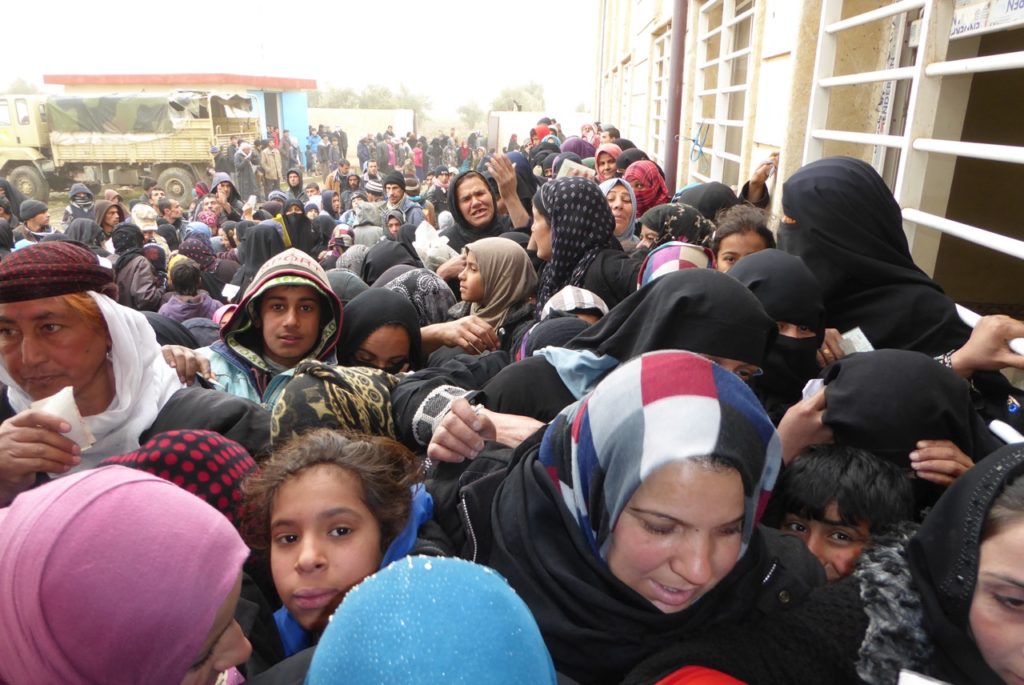 Desperate people in line for food