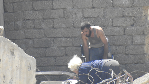 Omar, the day of the rescues, in ISIS territory helping his mother escape.