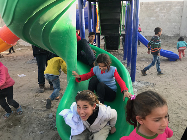 Children playing on the new playground.