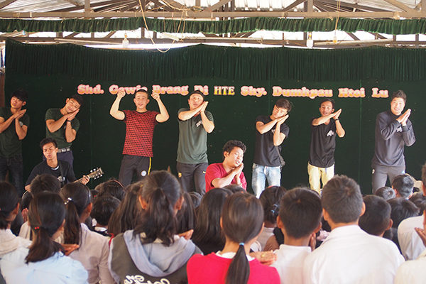 Rangers teaching a song during a GLC program.