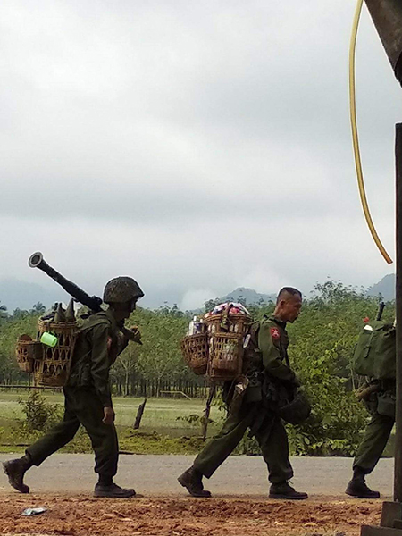 Burma Army soldiers moving to Ta Khee Ko, an old Burma Army position camp on September 11, 2018.