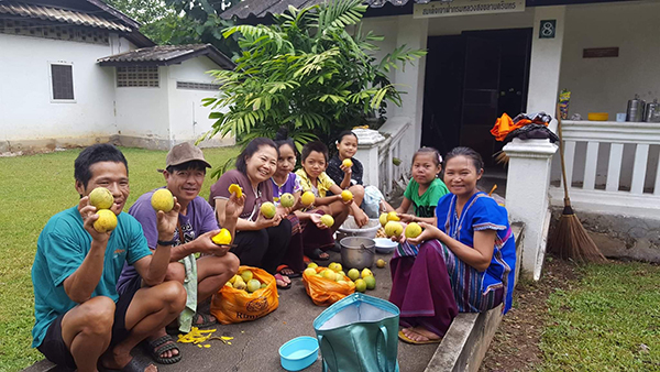 Naw Htee Ku Paw, second from right, with a Karen volunteer and other patients.