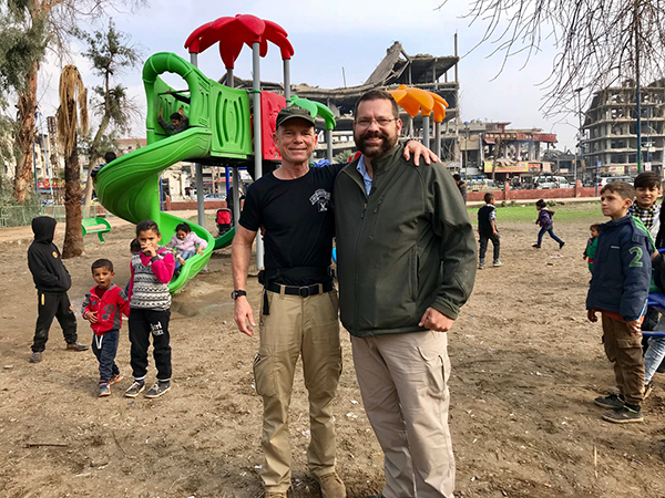 Congressman Garrett and Dave in Raqqa at a Reload Love playground.