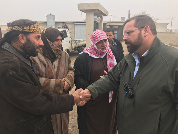 Congressman Garrett meets local Arabs in Dier Ezoir.