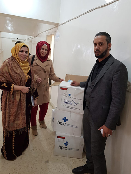 Delivering medicine to the Dier Ezoir civic council.