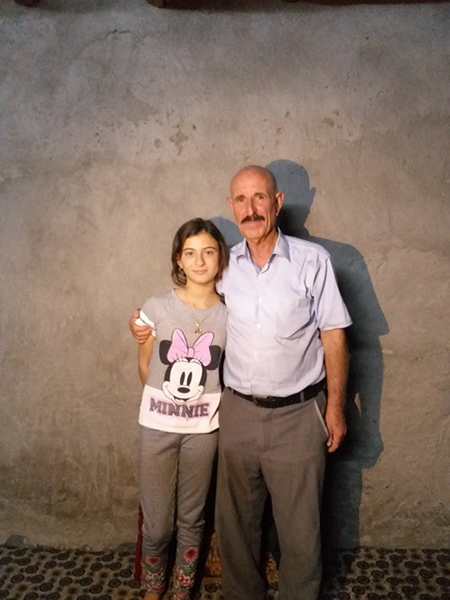 The cook with his daughter.