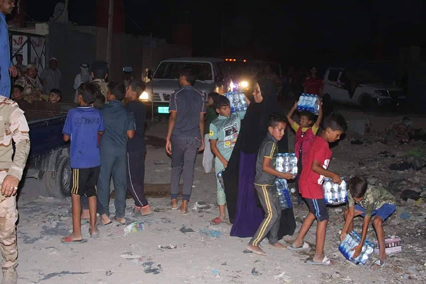 Distributing supplies in Basra